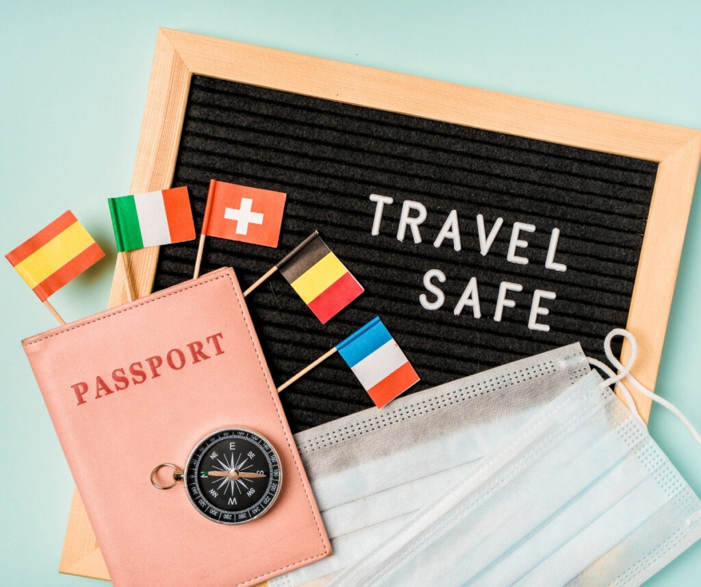 Travel safely concept Essential travel accessories passports medical masks