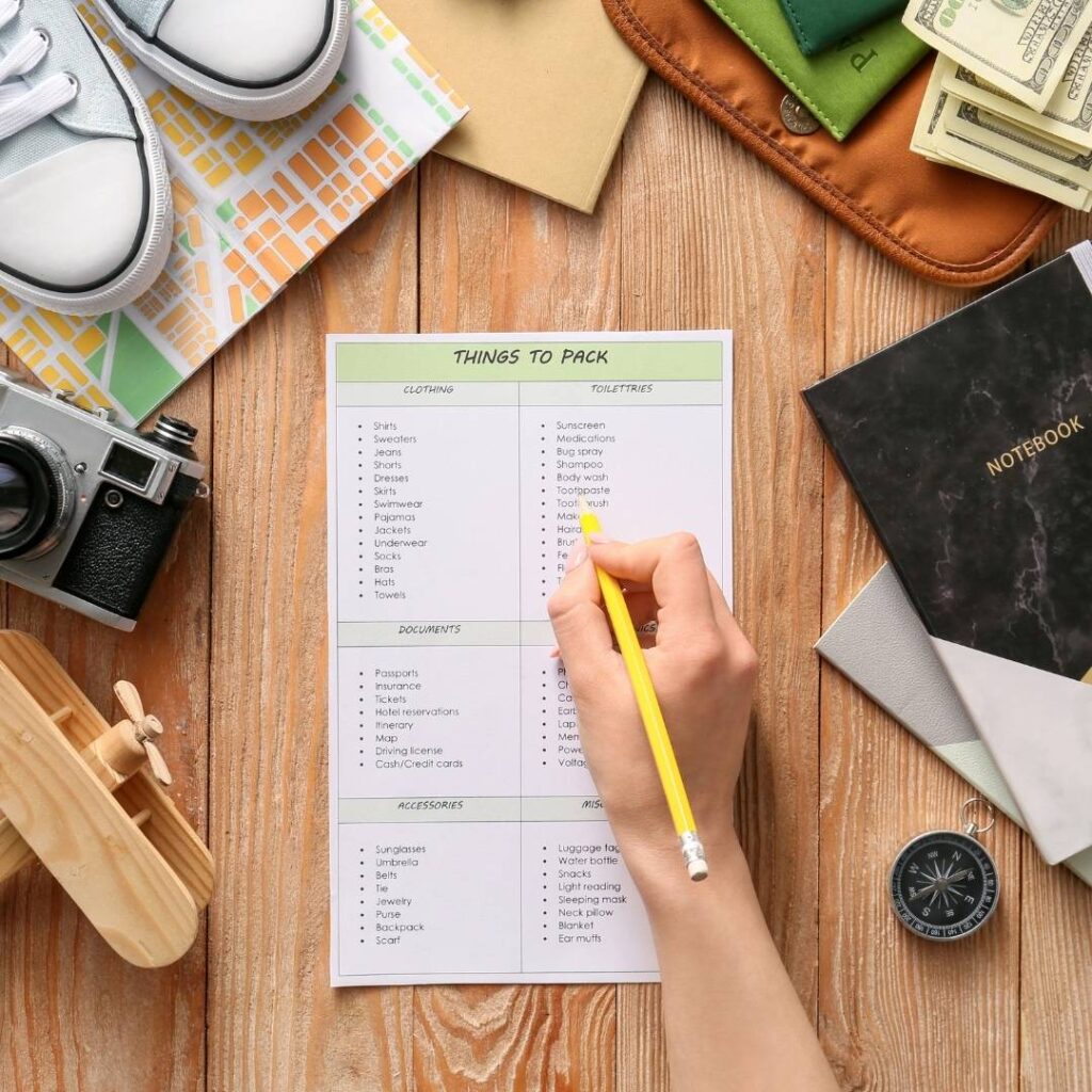 Woman Making Check List of Things to Pack for Travel