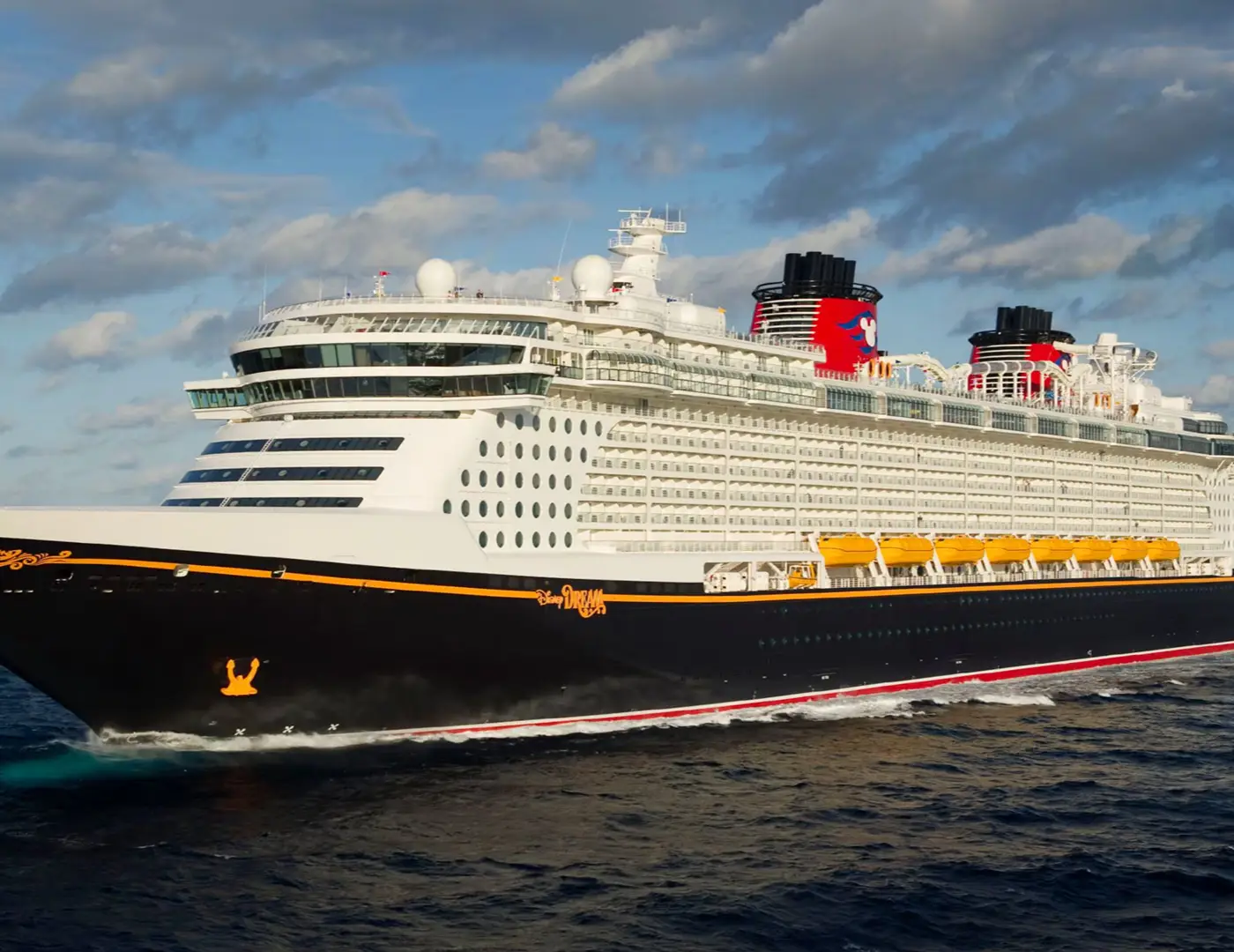 A Disney Cruise Line ship sailing on open water