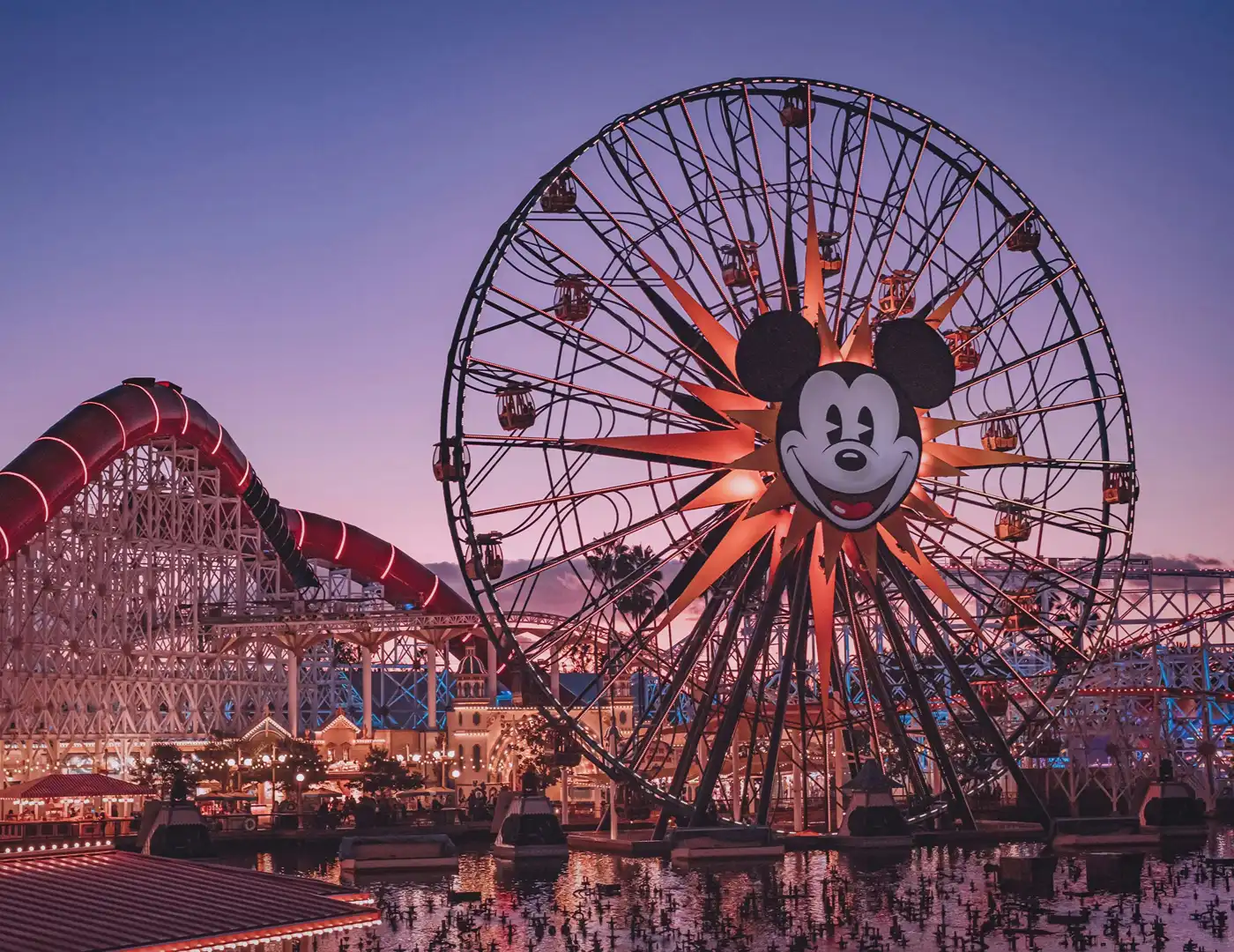 Pixar Pal-A-Round wheel lit at dusk at Disney California Adventure Park